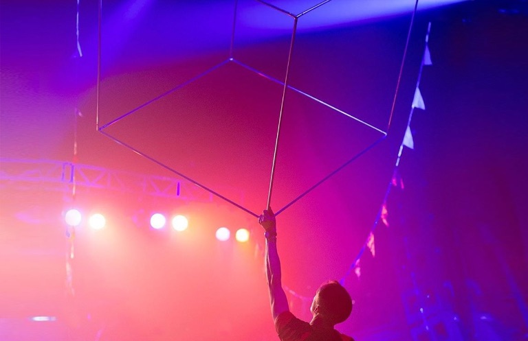 hire a spinning cube performer