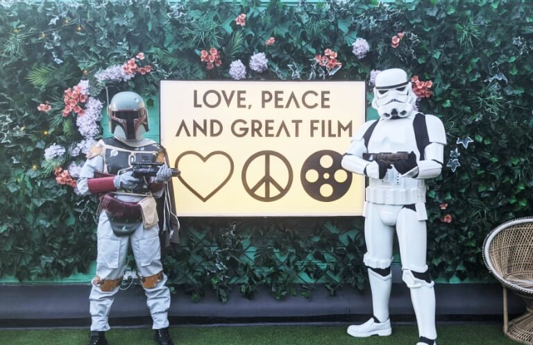 love, peace, and great film sign