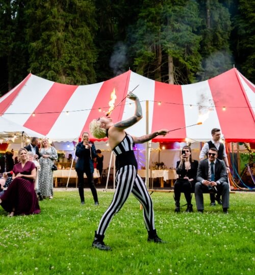 fire eater performs for wedding guests