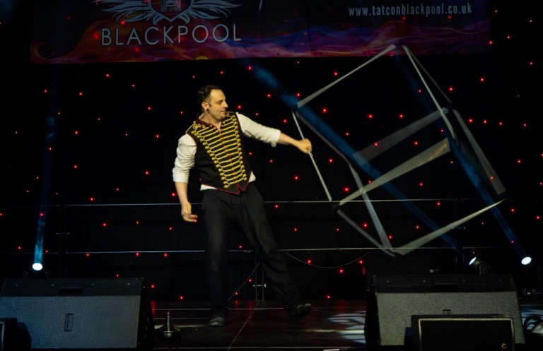 hire a spinning cube performer